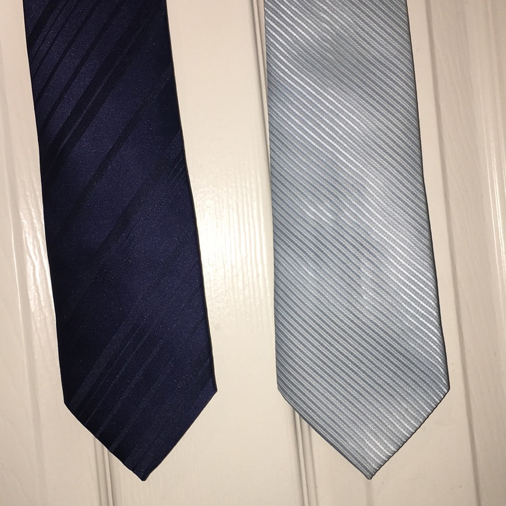 Two men’s ties (Thomas Nash and Rene Chagal)